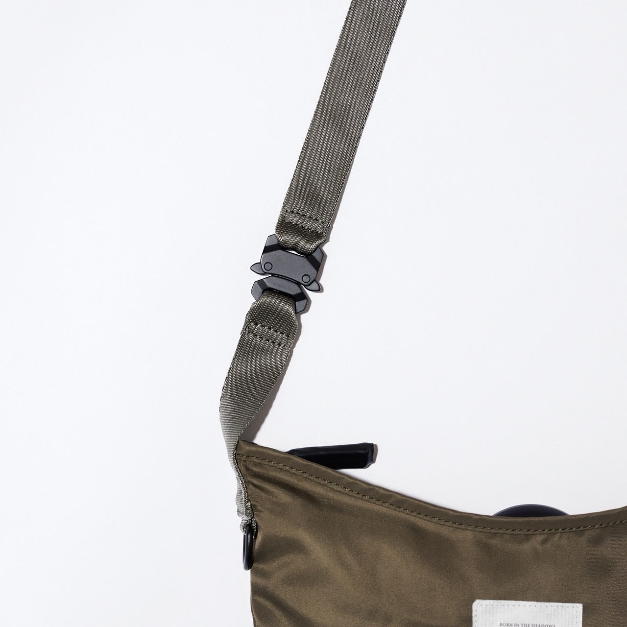 Cobra Lock Mini Sling Bag Khaki – C.U.L.T.U.R.E ONLINE STORE